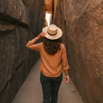 Woman walking through tunnel